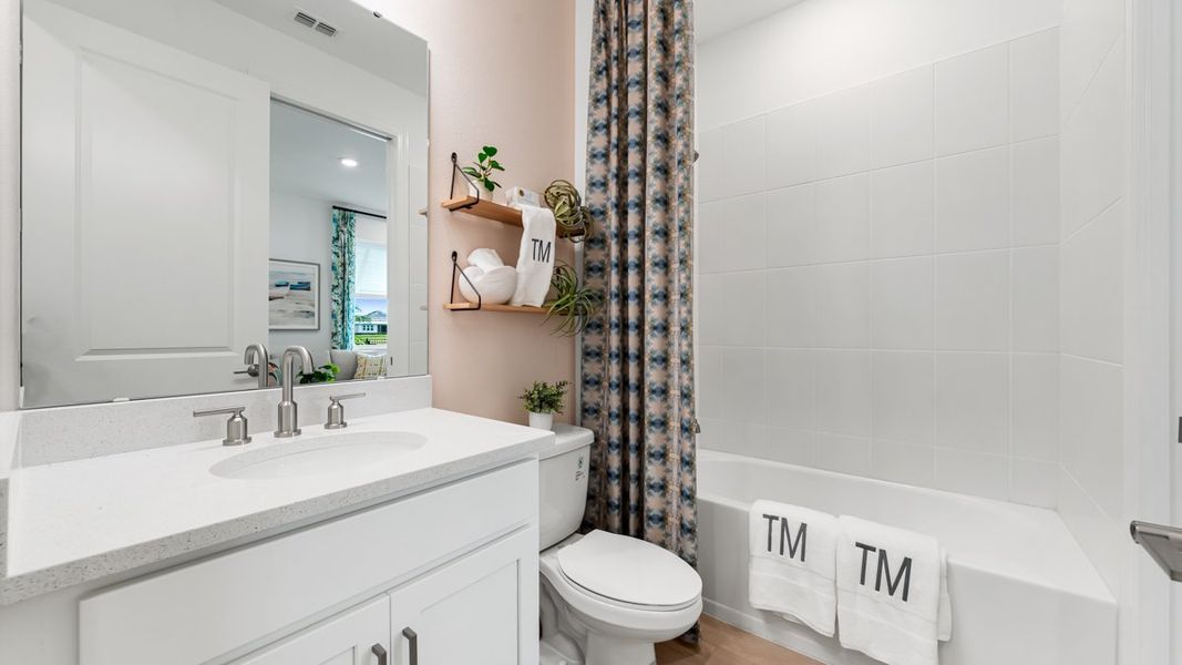Furnished interior view inside a new home in Coasterra Community Group Page, Palmetto (Image 10).