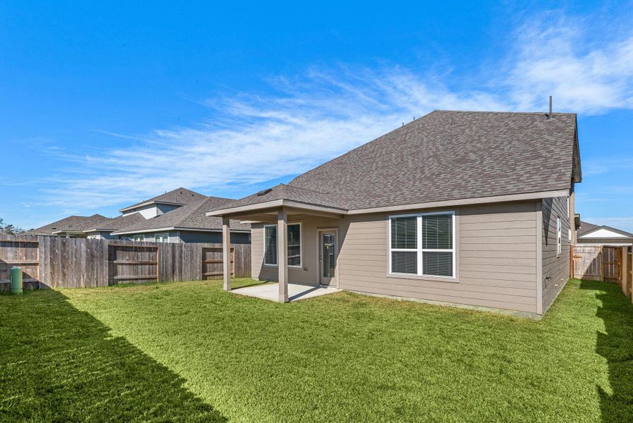 Exterior details and patio area of a home in Sundance Cove - Premier Series, Crosby (Image 28).