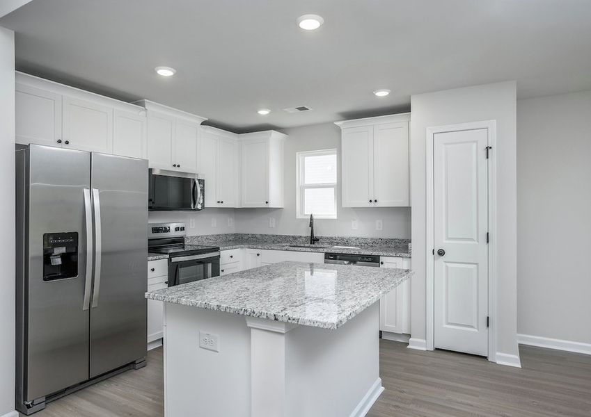 A spacious kitchen is perfect for preparing your favorite meals.