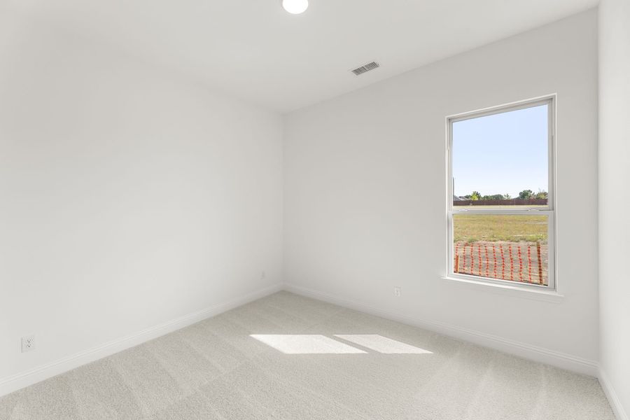 Representative unfurnished interior of a home built from the Del Rio by Windsor Homes in Anna Town Square, Anna (Image 26).