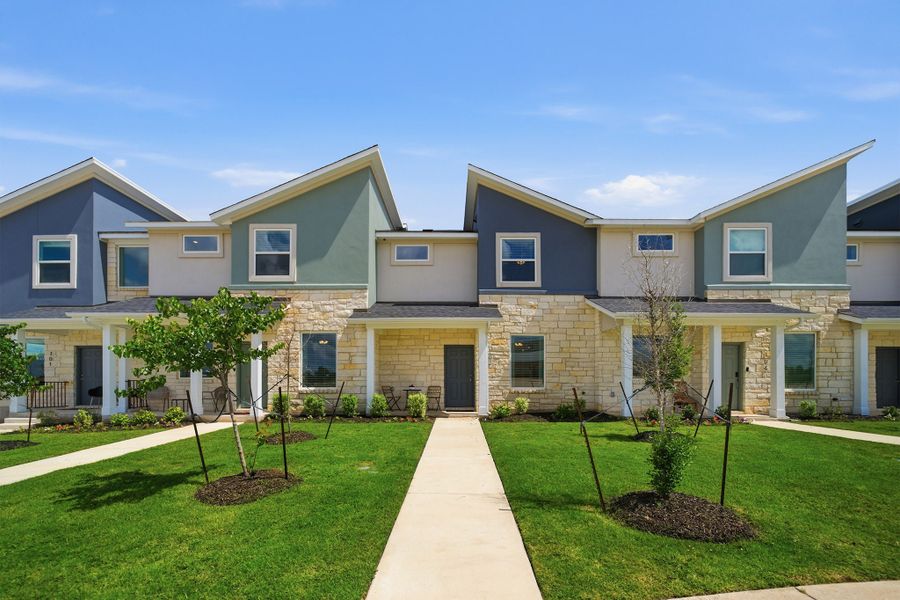 Representative exterior photo of a completed home built from the Pei by CastleRock Communities in Municipal Drive Townhomes, Leander, TX (Image 1). Representative exterior photo of a completed home built from the Pei by CastleRock Communities in Municipal Drive Townhomes, Leander, TX (Image 1).