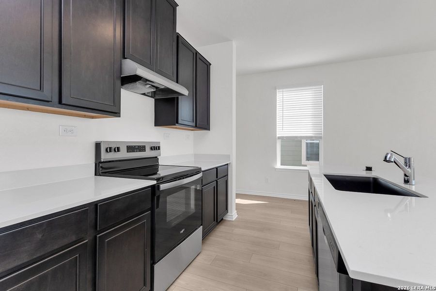 Furnished interior view inside a new home in The Granary - Heritage Collection, San Antonio (Image 4).