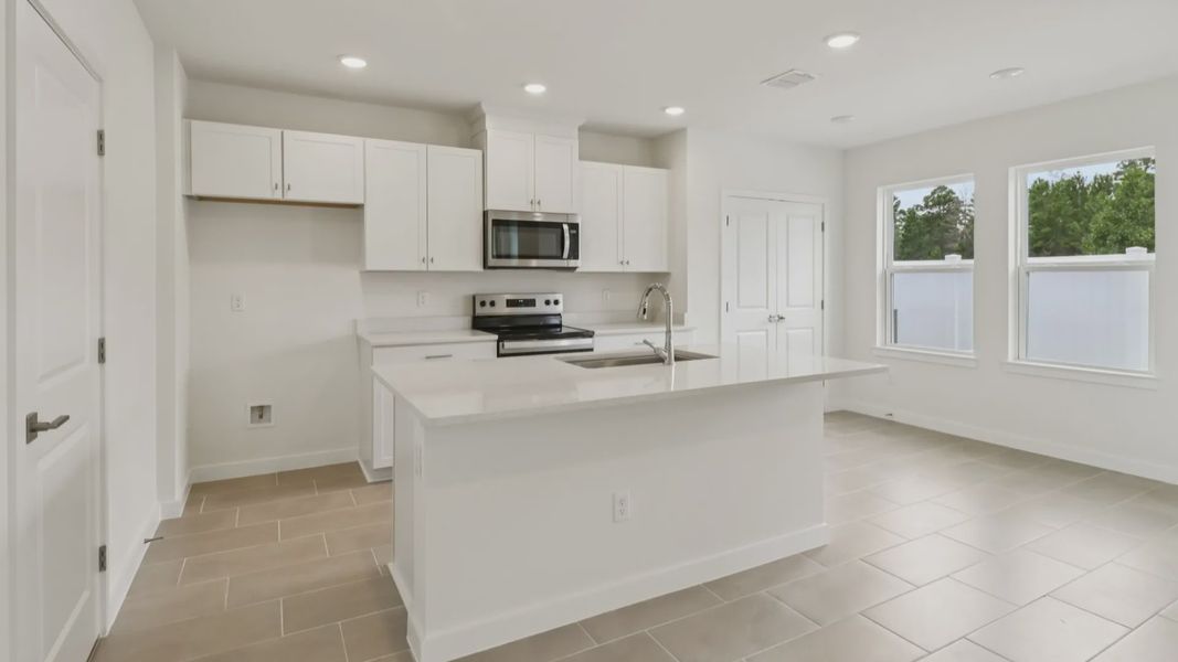 Furnished interior view inside a new home in Cyrene at Harmony, St. Cloud (Image 10).