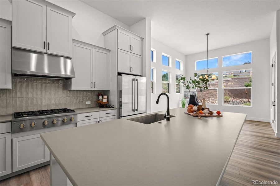 Furnished interior view inside a new home in Cloverleaf - Pinnacle Collection, Monument (Image 11).