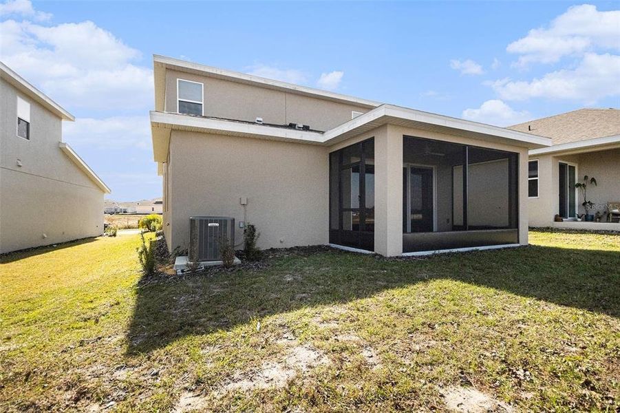 Exterior details and patio area of a home in Hills of Minneola, Minneola (Image 24).