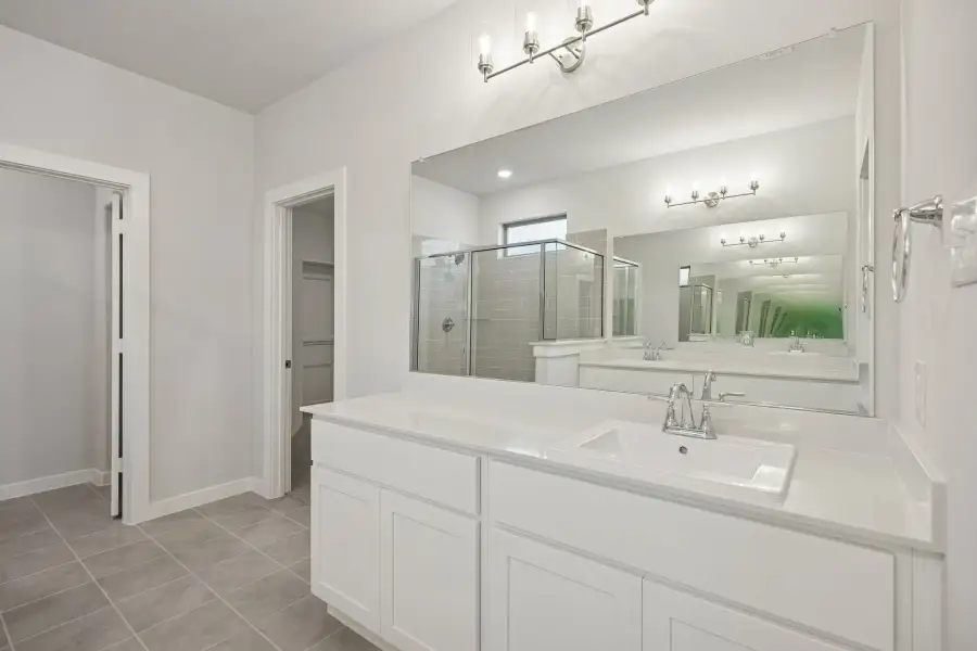 Primary Bathroom in the Wimbledon home plan by Trophy Signature Homes – REPRESENTATIVE PHOTO Primary Bathroom in the Wimbledon home plan by Trophy Signature Homes – REPRESENTATIVE PHOTO