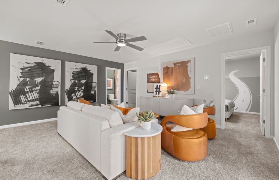 Furnished interior view inside a new home in Huxley, Apex (Image 6).