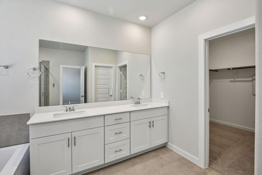 Photo is not of the actual home, but is an inspirational photo of builder’s model home and may depict options, furnishings, and/or decorator features that are not included