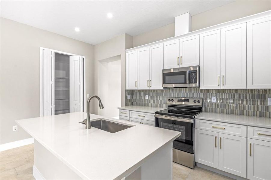 Furnished interior view inside a new home in Gray Hawk at Hole Two, Daytona Beach (Image 11).