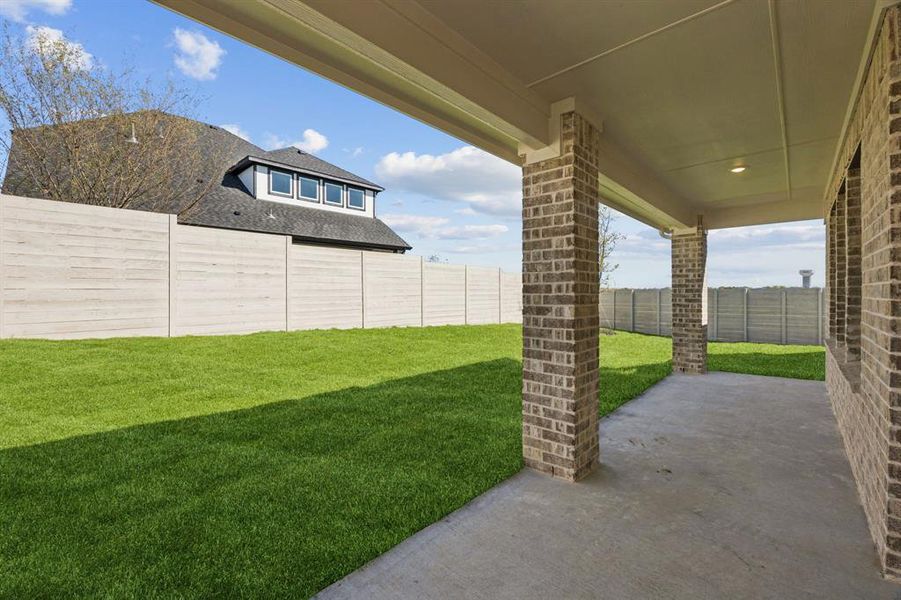 Exterior details and patio area of a home in Painted Tree - Woodland West, McKinney (Image 17).