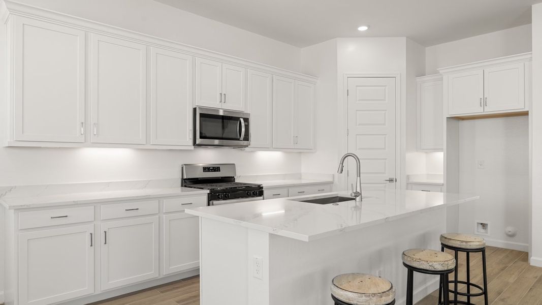 Representative furnished interior of a home built from the Crow by D.R. Horton in Apache Farms, Buckeye (Image 7).