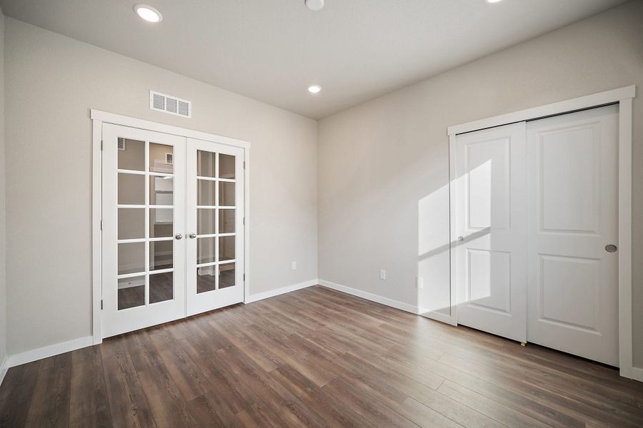 Spacious, unfurnished interior of a new home in The Glen, Colorado Springs (Image 17).