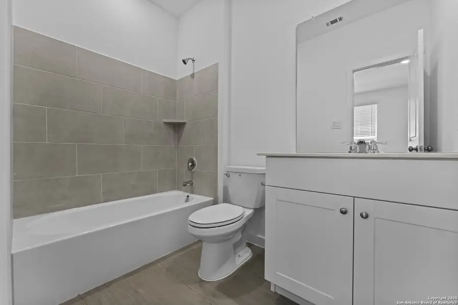 Furnished interior view inside a new home in Waterwheel: Coastline Collection, San Antonio (Image 6).