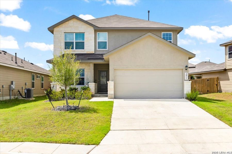 Front exterior of a new home in Riverstone at Westpointe, San Antonio, TX, highlighting curb appeal (Image 2). Front exterior of a new home in Riverstone at Westpointe, San Antonio, TX, highlighting curb appeal (Image 2).