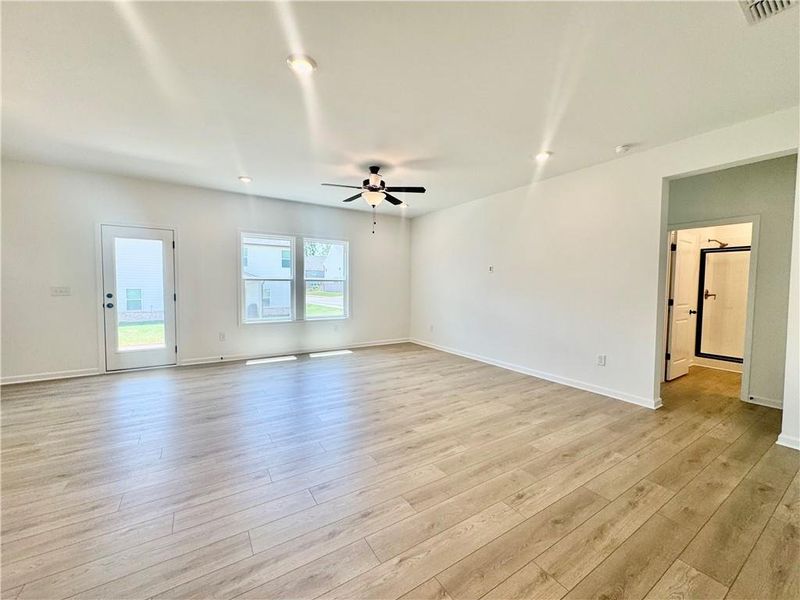 Spacious, unfurnished interior of a new home in Eastlyn Crossing, Flowery Branch (Image 13).