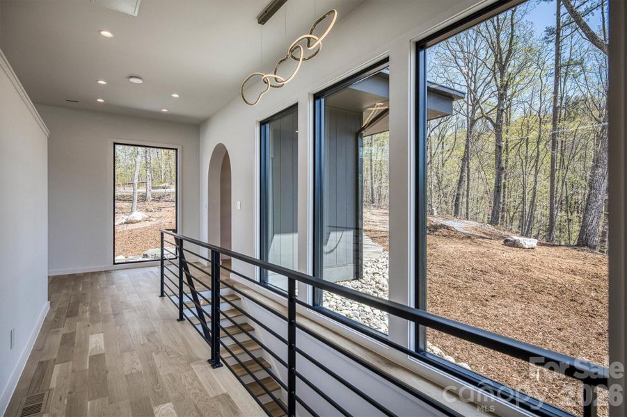 Front hallway to primary bedroom