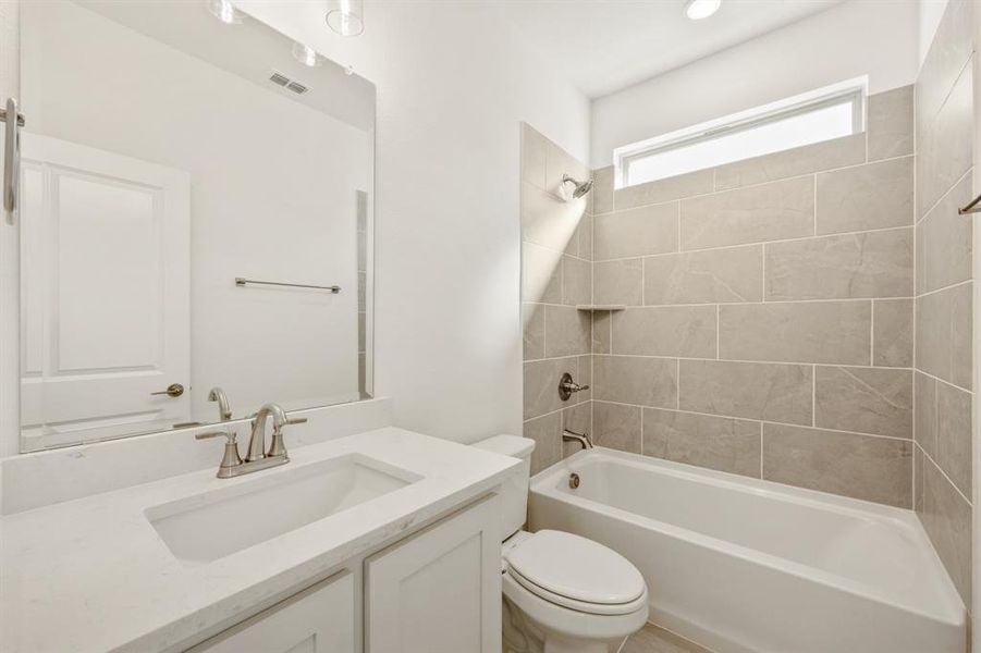 Furnished interior view inside a new home in Country Lakes, Denton (Image 12).