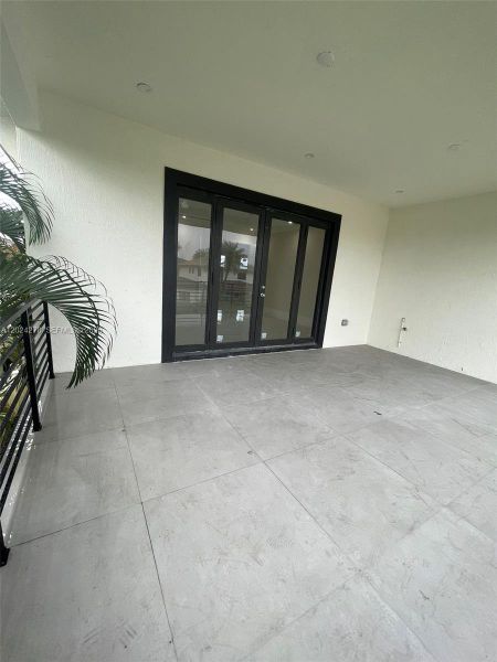 Exterior details and patio area of a home in , Miami (Image 3).