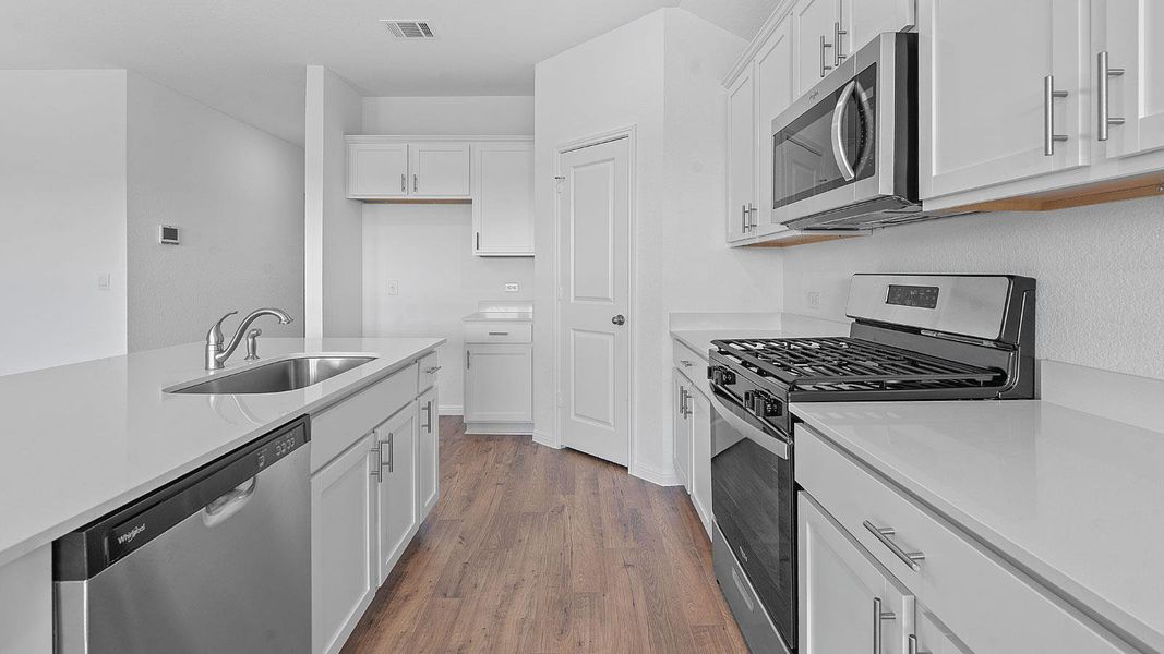 Furnished interior view inside a new home in Prairie Lakes, Buda (Image 7).