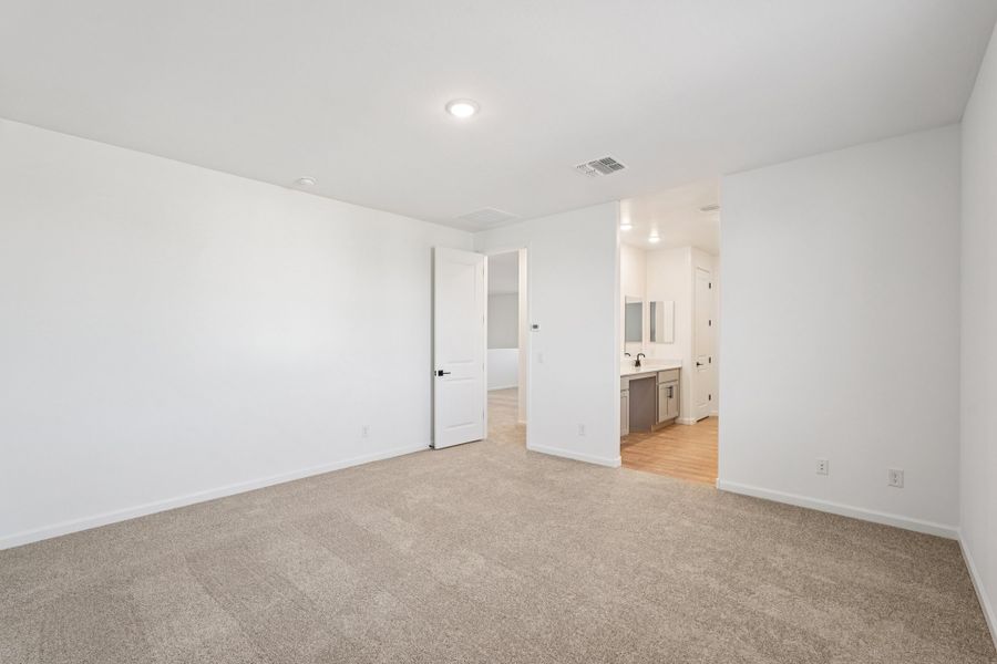 Primary suite. Finishes and options may vary.