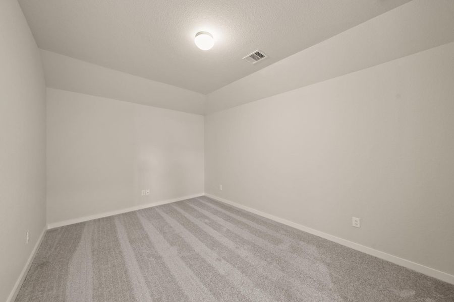 Spacious, unfurnished interior of a new home in Barton Creek Ranch, Conroe (Image 30). Spacious, unfurnished interior of a new home in Barton Creek Ranch, Conroe (Image 30).