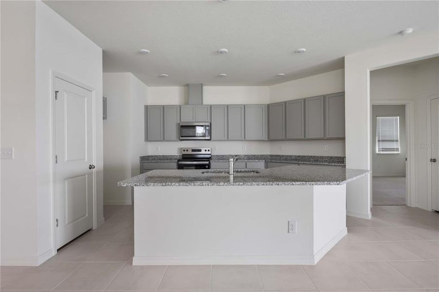 Furnished interior view inside a new home in Creekside at Rutland Ranch, Parrish (Image 6).