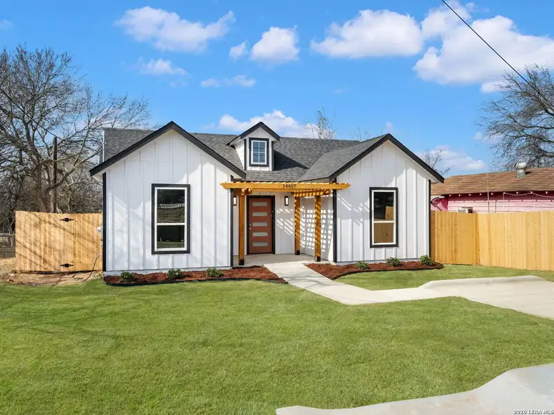 Front exterior of a new home in , Lytle, TX, highlighting curb appeal (Image 2).