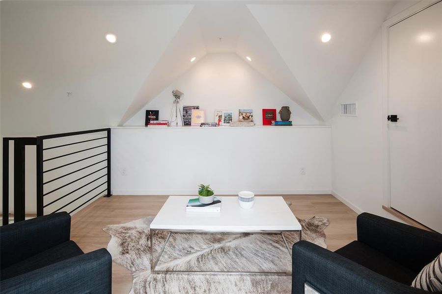 Loft in primary but also has access to rooftop terrace.