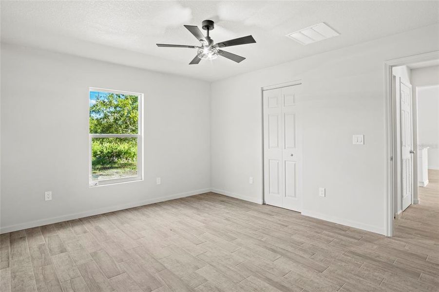 Spacious, unfurnished interior of a new home in , Okeechobee (Image 32).