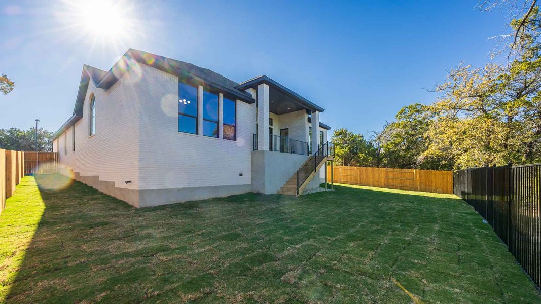 Exterior details and patio area of a home in Parkside On The River 60', Georgetown (Image 2).