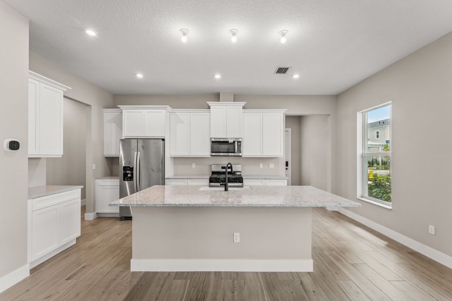 Representative furnished interior of a home built from the Monarch by Mattamy Homes in Newfield - Rosette Park, Palm City (Image 3).