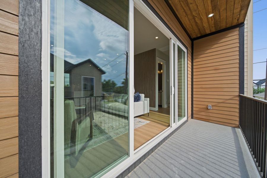 Exterior details and patio area of a home in , Houston (Image 3).
