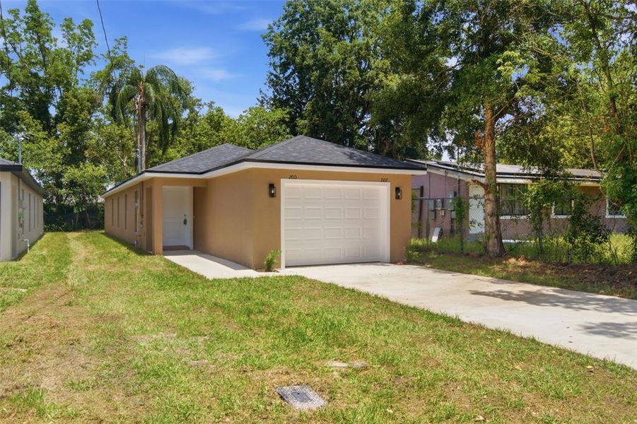 Front exterior of a new home in , Eustis, FL, highlighting curb appeal (Image 1). Front exterior of a new home in , Eustis, FL, highlighting curb appeal (Image 1).