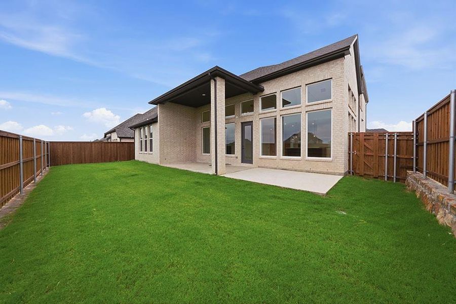 Exterior details and patio area of a home in The Homestead - 62', Rockwall (Image 4).