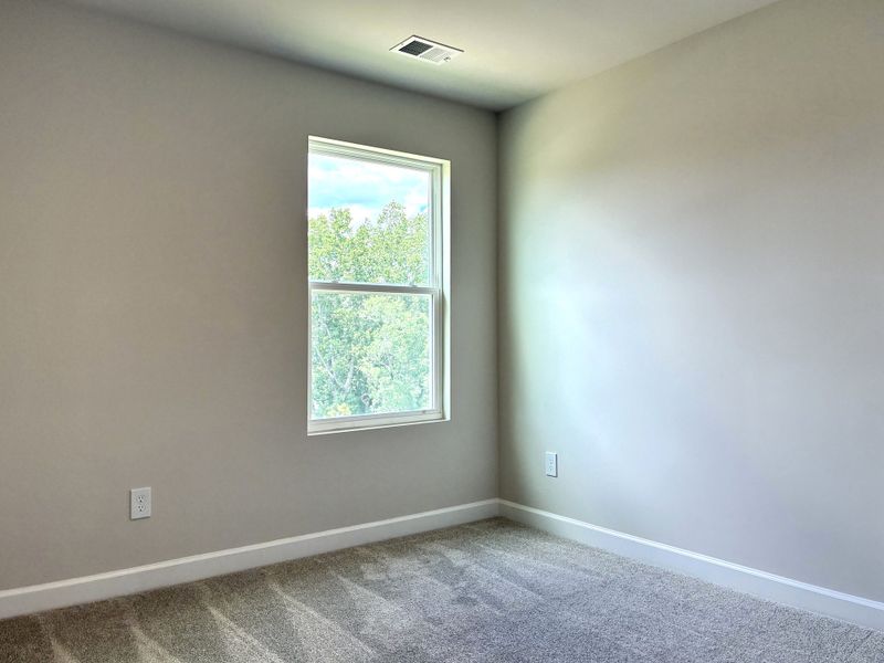 Spacious, unfurnished interior of a new home in Holly View, Greenville (Image 14).