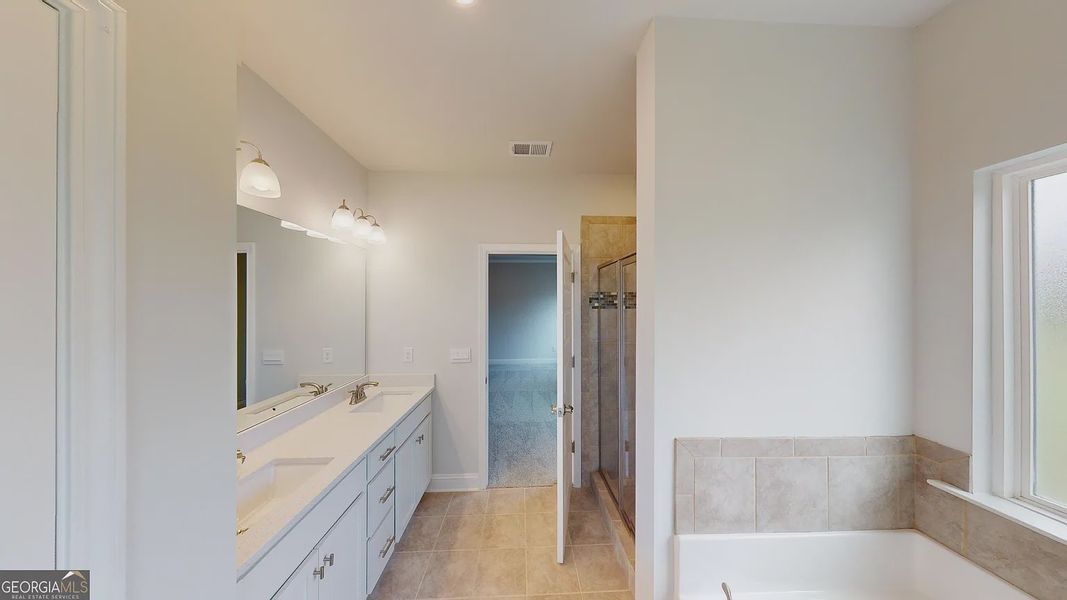 Furnished interior view inside a new home in Holliday Pass, Griffin (Image 10).