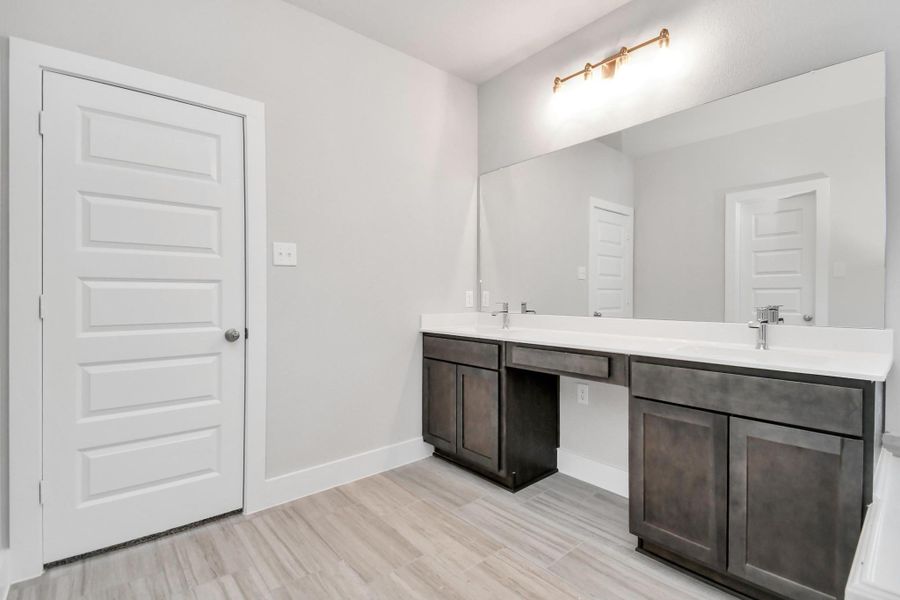 Example of completed home with similar plan. As-built colors and selections may vary.