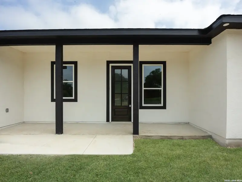 Exterior details and patio area of a home in , Elmendorf (Image 30). Exterior details and patio area of a home in , Elmendorf (Image 30).