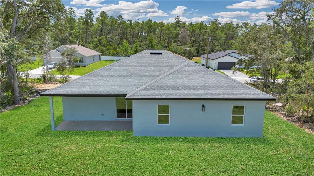 Front exterior of a new home in , Ocala, FL, highlighting curb appeal (Image 25).