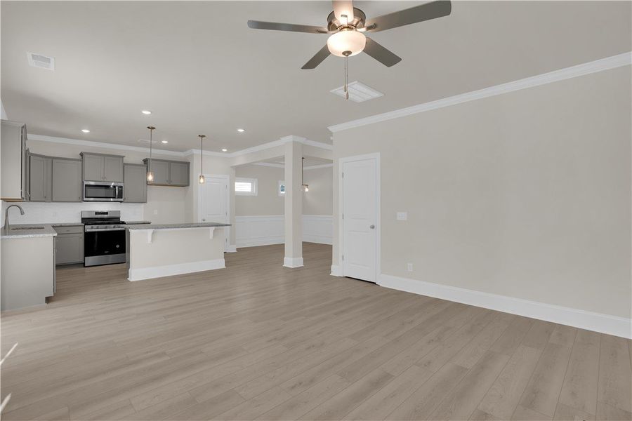 An inviting open-concept living area seamlessly co An inviting open-concept living area seamlessly co