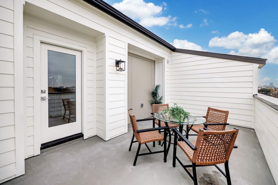 Exterior details and patio area of a home in Point East, Houston (Image 2). Exterior details and patio area of a home in Point East, Houston (Image 2).