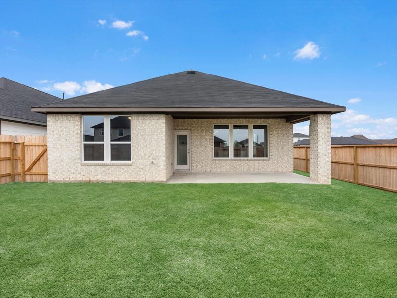 Exterior details and patio area of a home in Mason Woods, Cypress (Image 3).