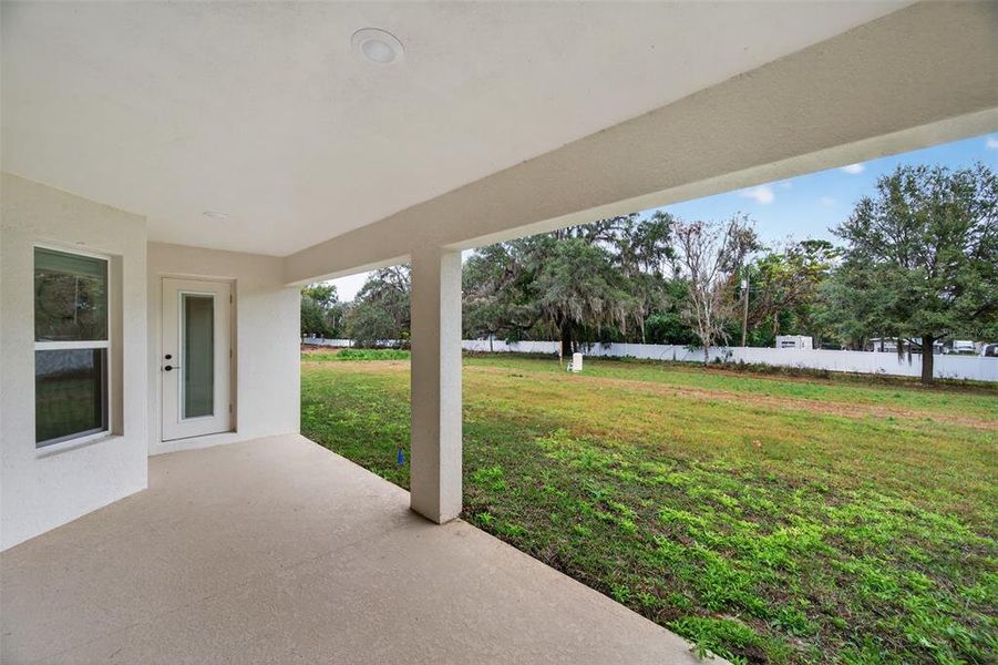 Exterior details and patio area of a home in Hill Country Estates, Dade City (Image 26).