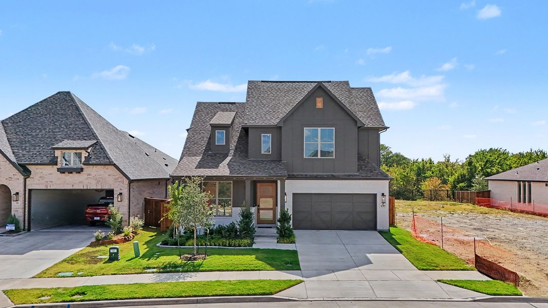 Front exterior of a new home in Aster Park, McKinney, TX, highlighting curb appeal (Image 24).
