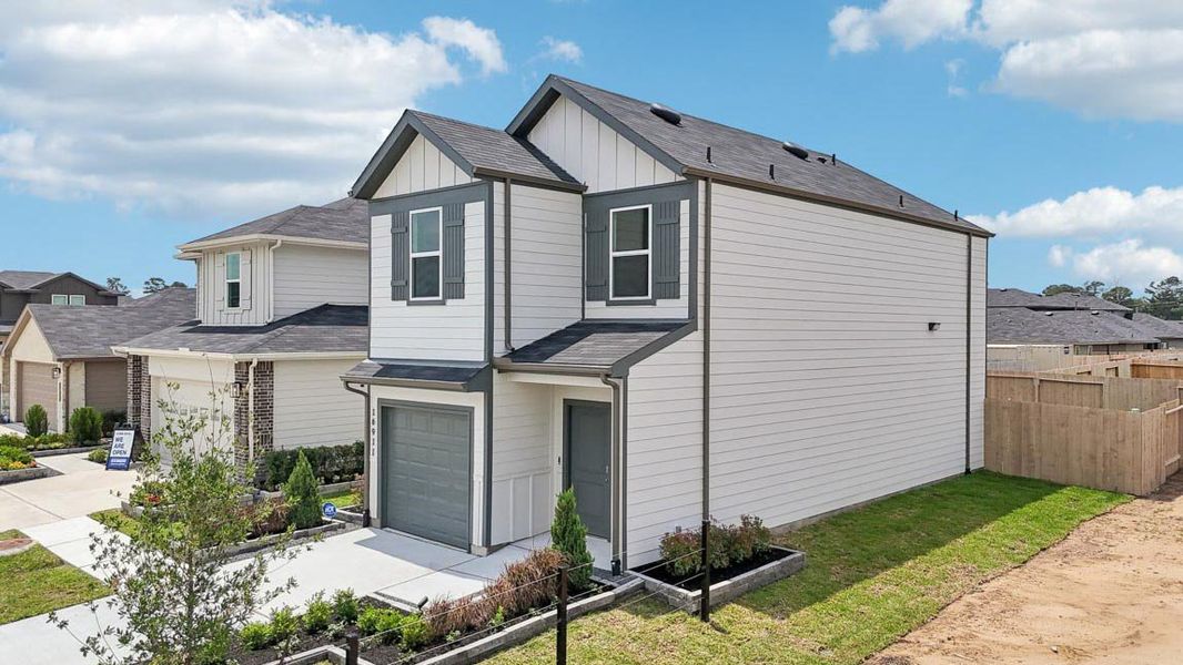 Representative exterior photo of a completed home built from the Dillon by D.R. Horton in The Villas at Legacy Park, Houston, TX (Image 22).