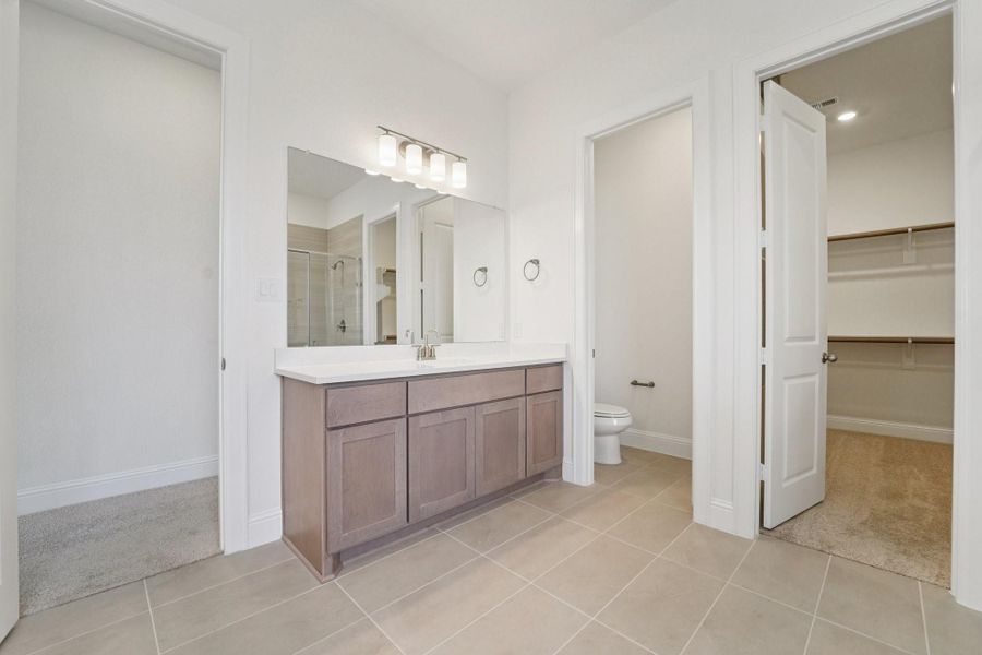 Furnished interior view inside a new home in Meridiana 70', Manvel (Image 13).