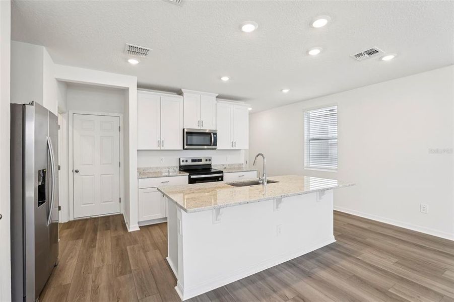 Furnished interior view inside a new home in The Meadow at Crossprairie Townes, St. Cloud (Image 13).