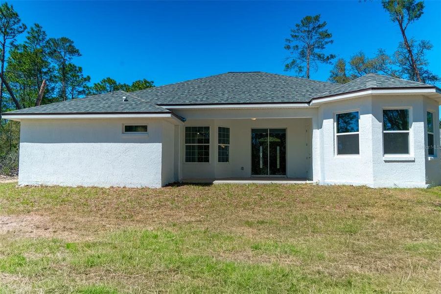 Exterior details and patio area of a home in , Ocala (Image 4).