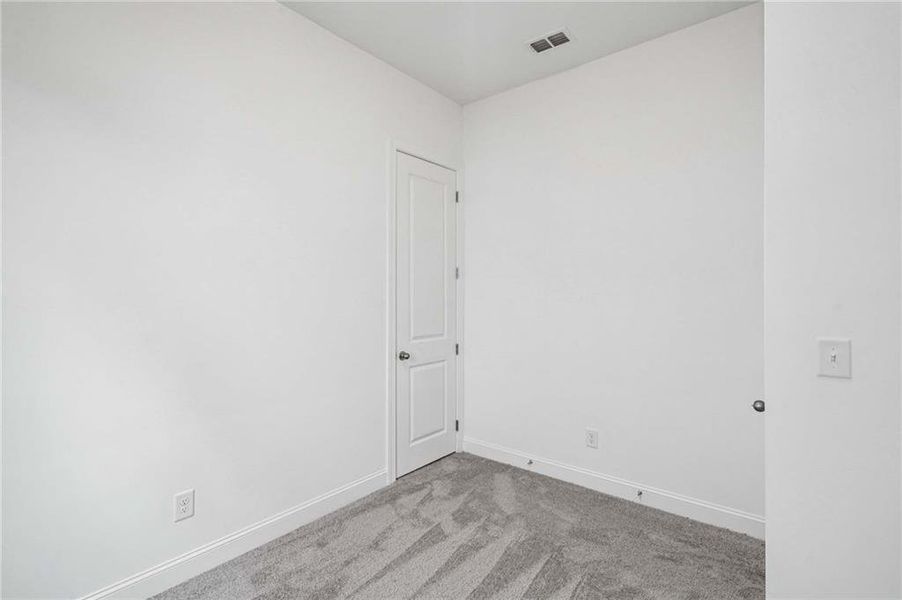 Spacious, unfurnished interior of a new home in East Harbor II at Chestatee, Dawsonville (Image 22).