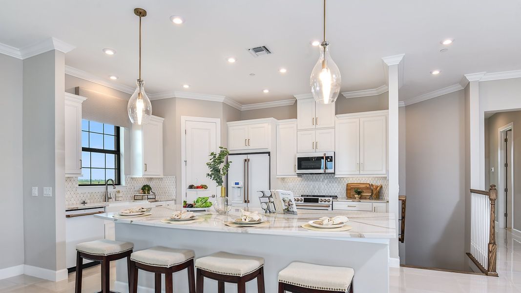 Furnished interior view inside a new home in Esplanade by the Islands Coach Homes, Naples (Image 4).